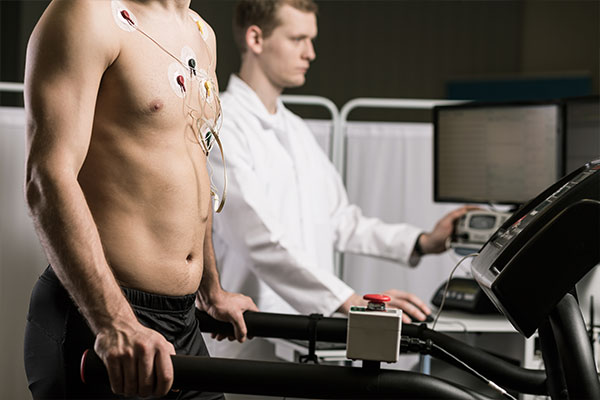 Man on a treadmill completing a heart stress test