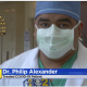 Dr Phillip Alexander wearing a face mask